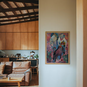 Flowers Desert Romance cowboy art print by Caya Crum — framed in a wood-accent room