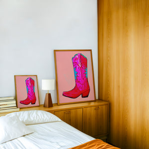 Fort Worth Pink Boot cowboy boot art print by Caya Crum — framed in a wood-accent room