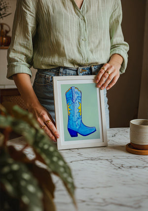 Fort Worth Boot Blue cowboy boot art print by Caya Crum — neutral frame room mockup