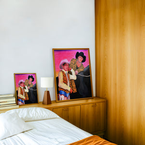 The Cowboy Gaze cowboy art print by Caya Crum — framed in a wood-accent room