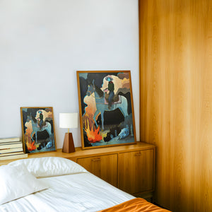 Missy Night Ride horse art print by Caya Crum — framed in a wood-accent room