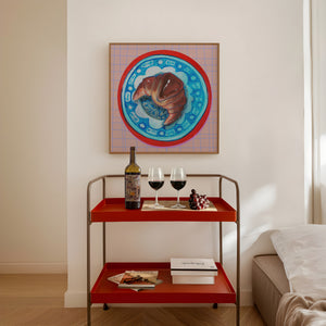 A croissant painted on a blue and white chinoiserie plate — square kitchen wall art by Caya Crum