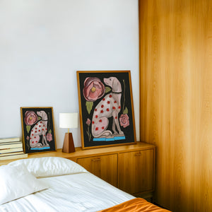 Greyhound With Roses dog art print by Caya Crum — framed in a wood-accent room