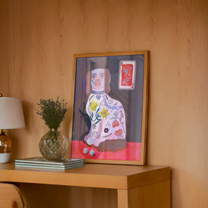 Dice Playing Card dog art print by Caya Crum — framed in a wood-accent room