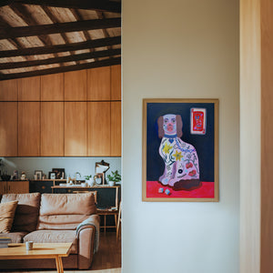 Dice Playing Card dog art print by Caya Crum — framed in a wood-accent room