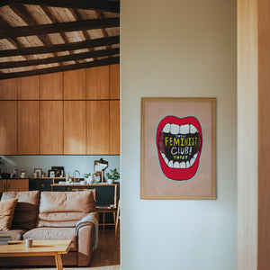 Feminist Club Poster art print by Caya Crum — framed in a wood-accent room