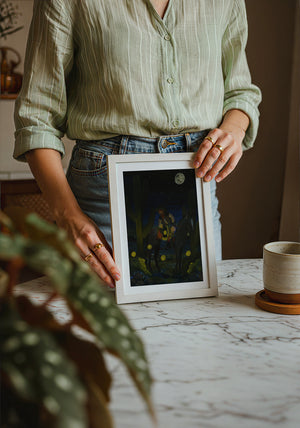 Fire Flies Cowboy at Night western art print by Caya Crum — neutral frame room mockup