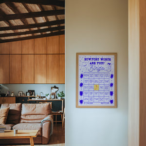 Bingo Card Blue Fort Worth art print by Caya Crum — framed in a wood-accent room
