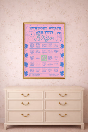 Fort Worth bingo pink print by Caya Crum framed above a dresser
