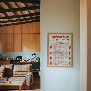 Bingo Card Yellow Fort Worth art print by Caya Crum — framed in a wood-accent room