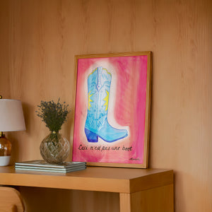 Fort Worth Boot Pink cowboy boot art print by Caya Crum — framed in a wood-accent room
