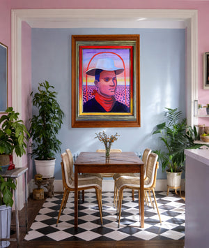 JY Crum cowboy portrait print by Caya Crum framed in a pink and blue room