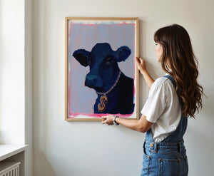 Money Cow pink pop art cow print by Caya Crum — framed room mockup