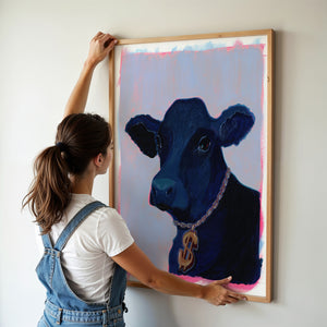Money Cow black cow print by Caya Crum — framed room mockup