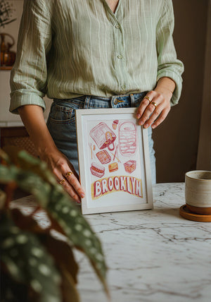 Brooklyn city art print by Caya Crum — neutral frame room mockup
