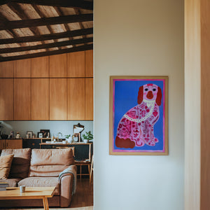 Pink Dog Tattoo dog art print by Caya Crum — framed in a wood-accent room