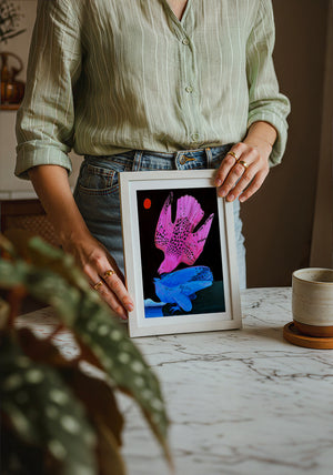 Pink & Blue Birds at Night bird art print by Caya Crum — neutral frame room mockup