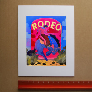 Rodeo Sign Bronco Buster by Caya Crum, shown in a room