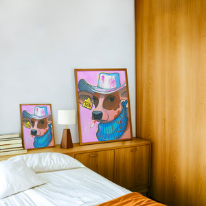 Hazel cow art print by Caya Crum — framed in a wood-accent room