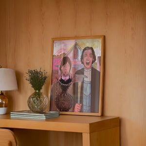 Shining American Gothic weirdcore art print by Caya Crum — framed in a wood-accent room