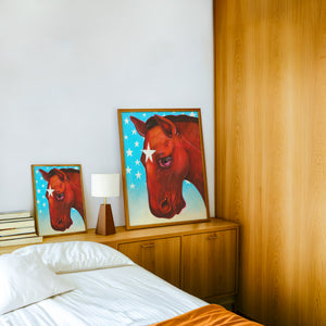 Star Horse Dreamer horse art print by Caya Crum — framed in a wood-accent room