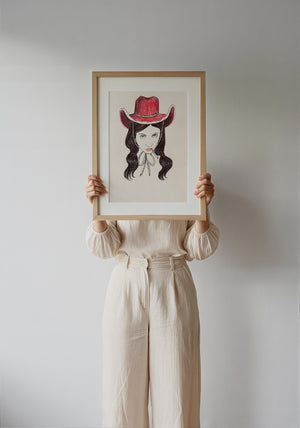 Tavi cowgirl art print by Caya Crum — framed with velvet mat