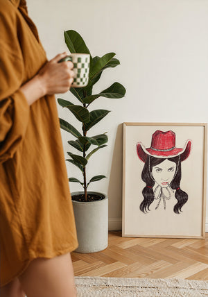 Tavi cowgirl art print by Caya Crum — framed with velvet mat