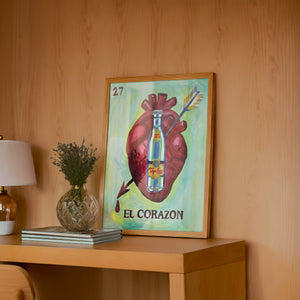 Lotería El Corazón Topo Chico art print by Caya Crum — framed in a wood-accent room