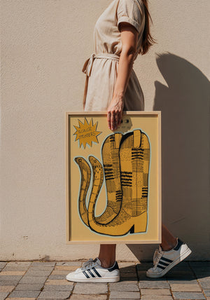 Roach Stompers cowboy boot art print by Caya Crum — framed with velvet mat