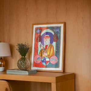 Saint Willie Nelson music wall art print by Caya Crum — framed in a wood-accent room