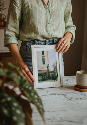 Zabar's NYC art print by Caya Crum — neutral frame room mockup