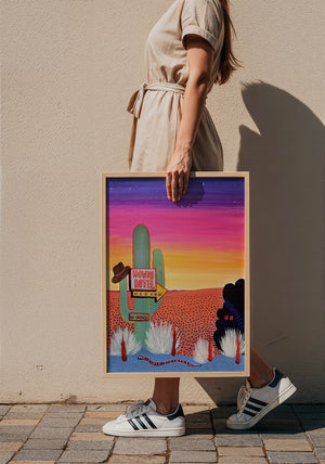 Howdy Hotel Neon cactus art print by Caya Crum — framed with velvet mat