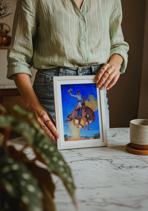 Bronco Buster Night rodeo art print by Caya Crum — neutral frame room mockup