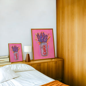 Diet Coke & Bluebonnets kitchen art print by Caya Crum — framed in a wood-accent room