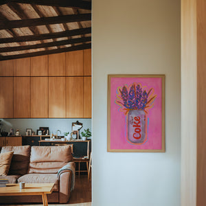 Diet Coke & Bluebonnets kitchen art print by Caya Crum — framed in a wood-accent room