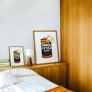 Ranch Style Beans Sketchbook kitchen art print by Caya Crum — framed in a wood-accent room