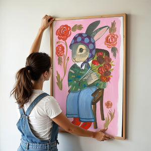 Bunny with Flowers bunny art print by Caya Crum — framed vertical room scene