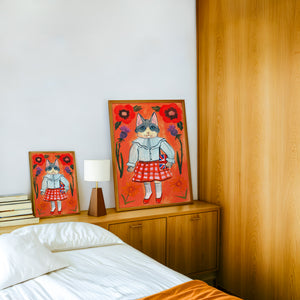 English Schoolgirl Cat cat art print by Caya Crum — framed in a wood-accent room