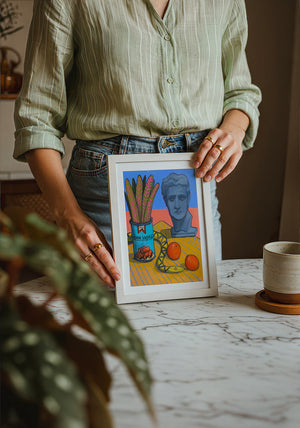 Vienna Sausage Picnic Greco Roman art print by Caya Crum — neutral frame room mockup