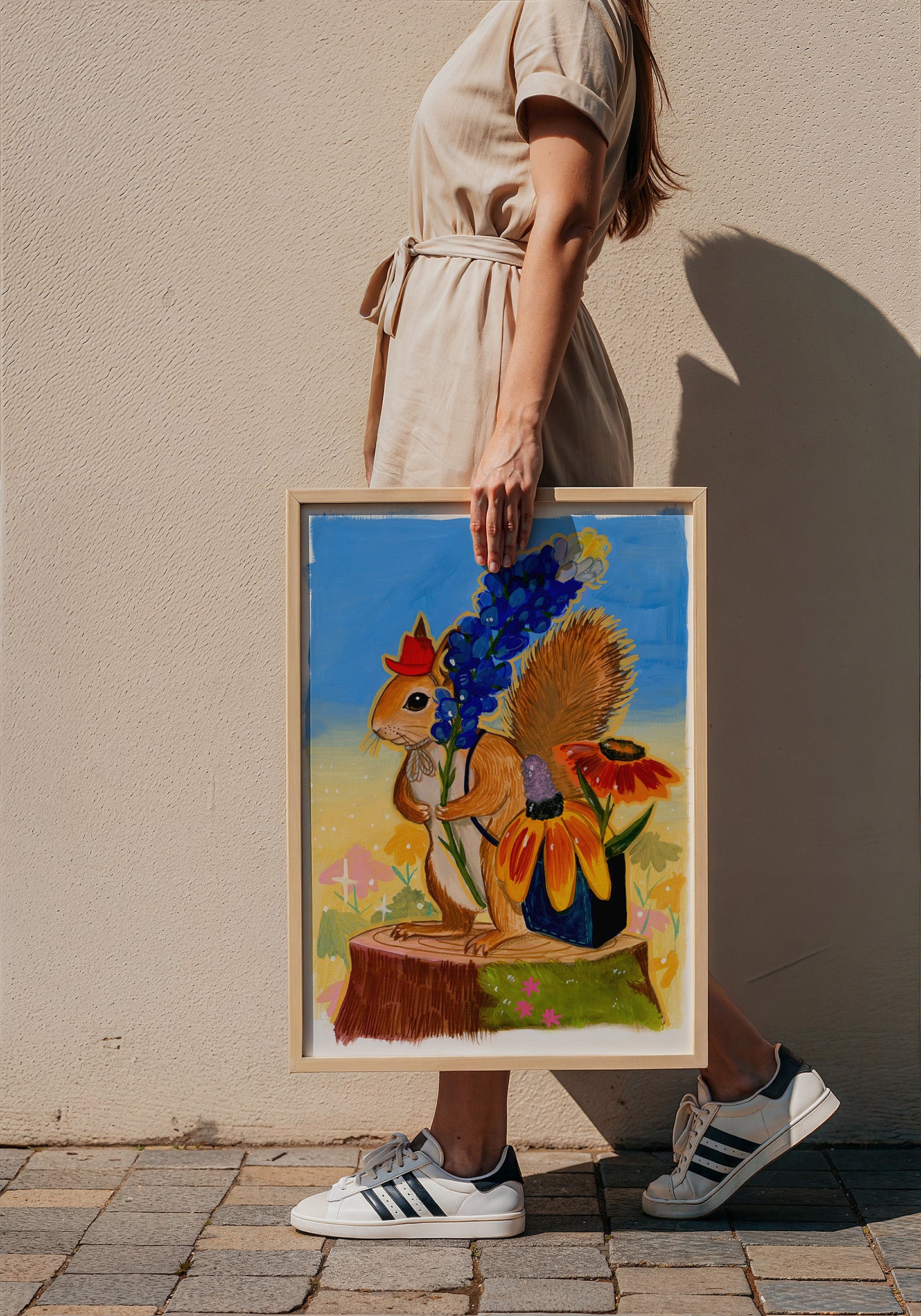 Ms. Squirrel in the Bluebonnets squirrel art print by Caya Crum — framed with velvet mat