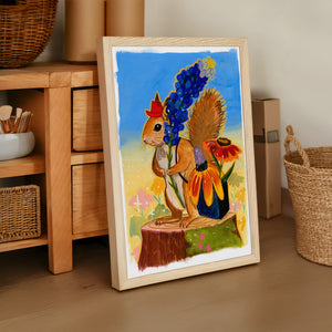 Ms. Squirrel in the Bluebonnets squirrel art print by Caya Crum — framed vertical room scene