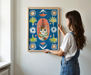 Party Cat Poppett cat art print by Caya Crum — framed vertical room scene