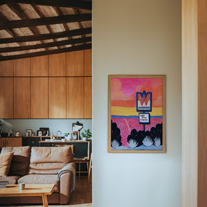 Honey Butter My Biscuits texas art print by Caya Crum — framed in a wood-accent room