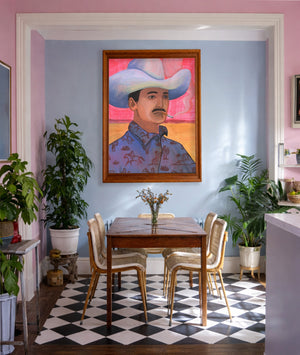Cowboy art print Jesse by Caya Crum on a pink and blue room wall
