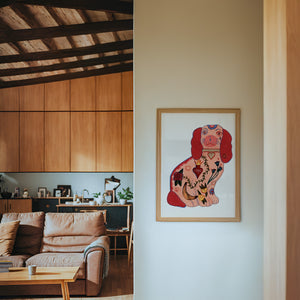 Staffordshire Tattoo Dog dog art print by Caya Crum — framed in a wood-accent room