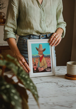 Caya's World Desert Self Portrait Dr Pepper art print by Caya Crum — neutral frame room mockup
