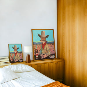 Caya's World Desert Self Portrait Dr Pepper art print by Caya Crum — framed in a wood-accent room