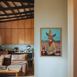 Caya's World Desert Self Portrait Dr Pepper art print by Caya Crum — framed in a wood-accent room