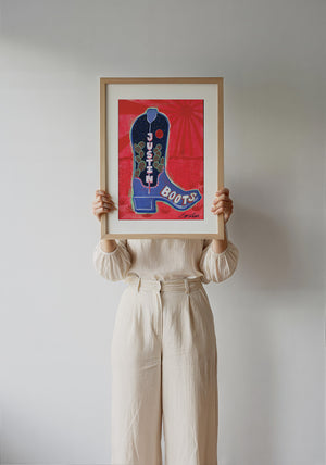 Justin Boot cowboy boot art print by Caya Crum — framed with velvet mat