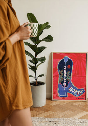 Justin Boot cowboy boot art print by Caya Crum — framed with velvet mat